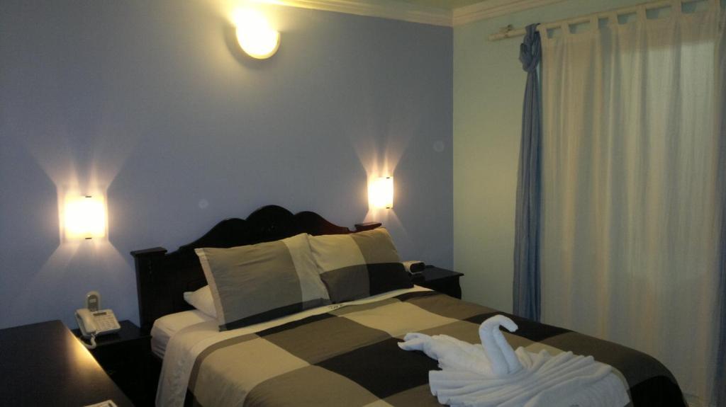 Hotel Eskalima Alajuela Bilik gambar