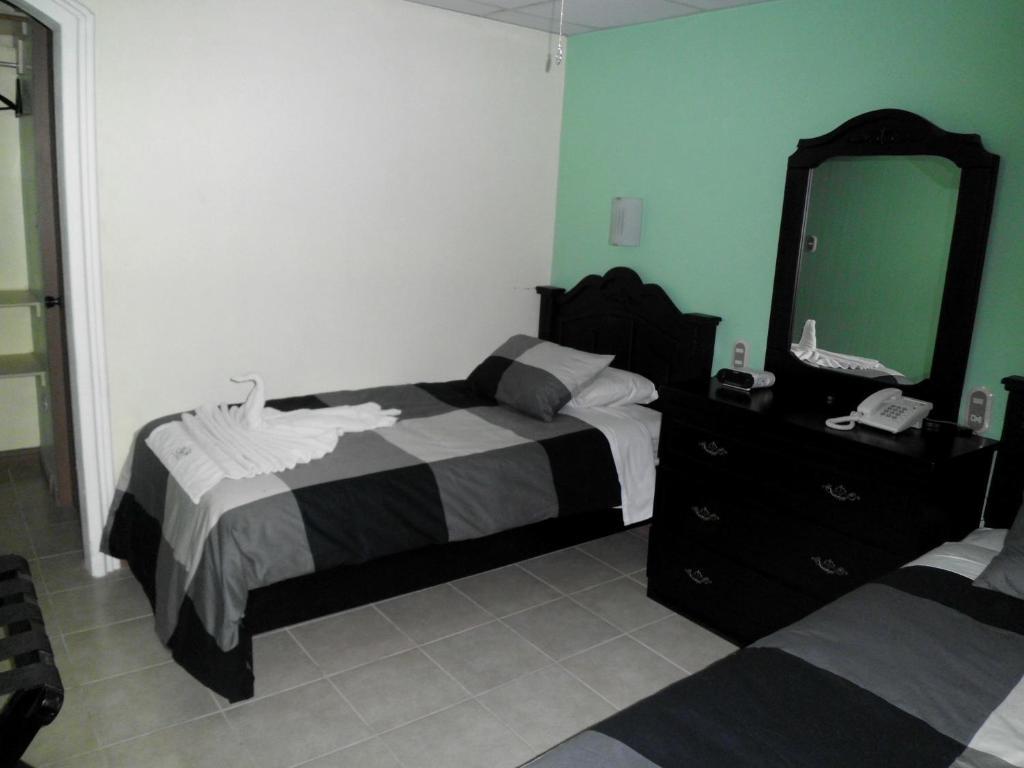 Hotel Eskalima Alajuela Bilik gambar